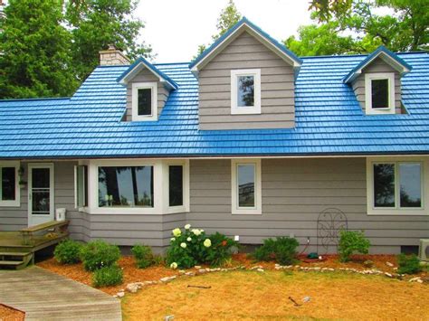 house with ocean blue metal roof|exterior metal roofing homes.